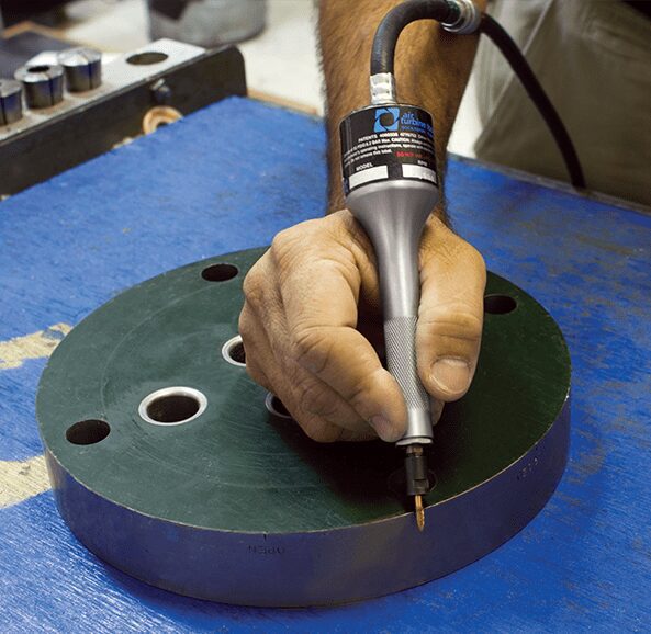 A 201SV pneumatic pencil deburring a part.